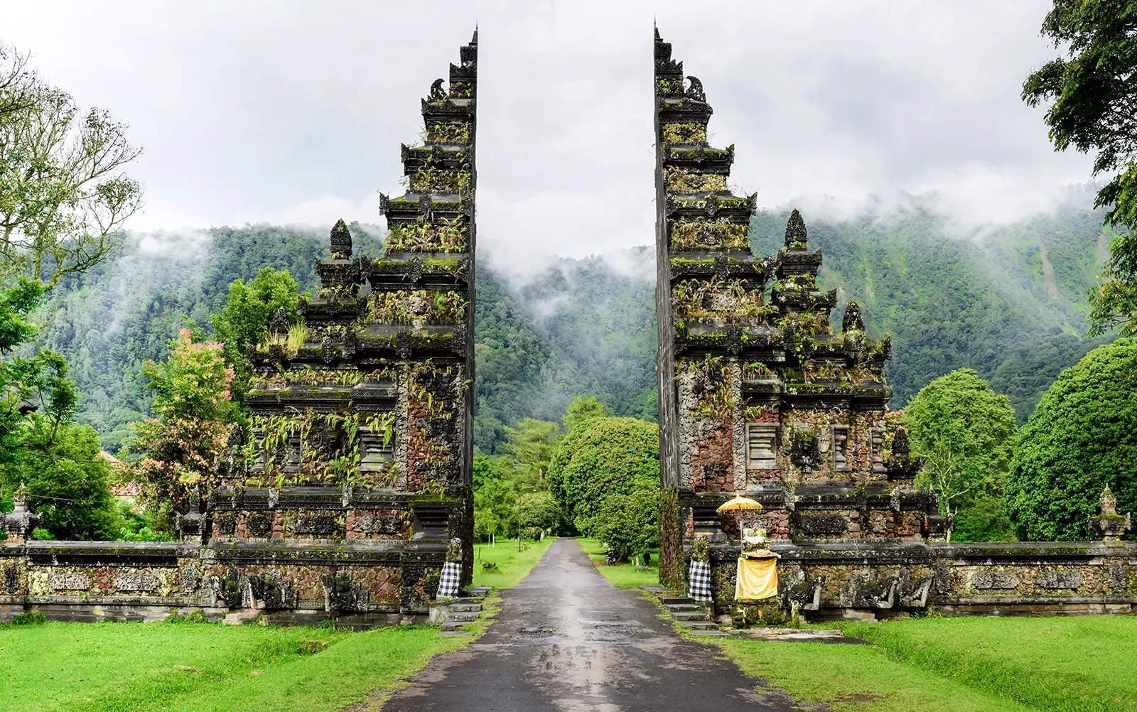 Shot of shrine/gateway in Bali, forest behind.