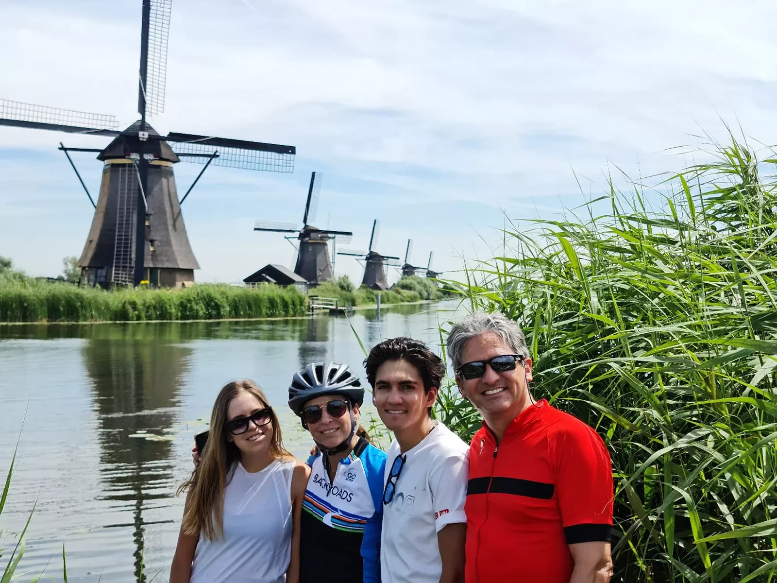 Family shot in front of windmills