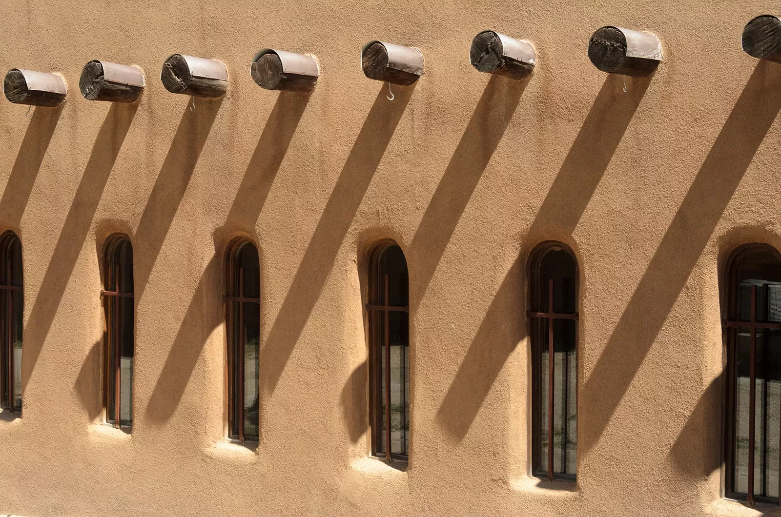 Windows of tan building shot