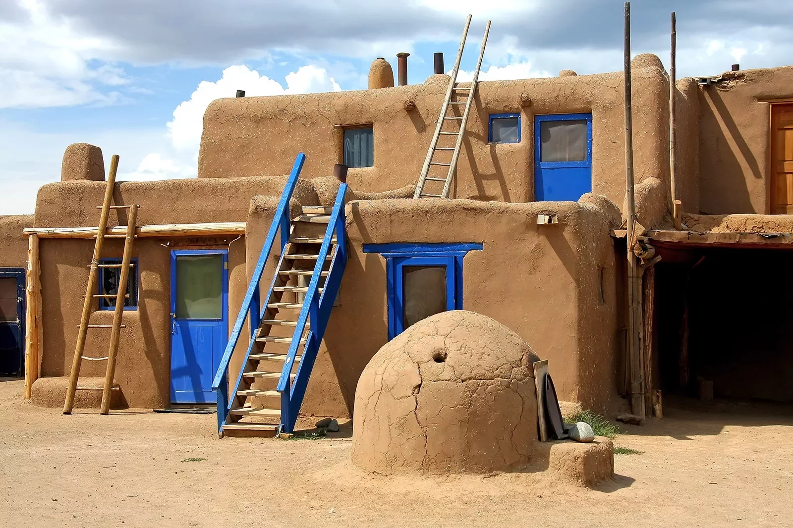 Orange clay structure with blue doors