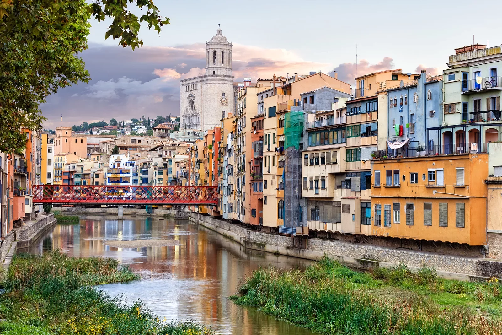 Wide shot of Onyar River running through Girona and it's colorful buildings.