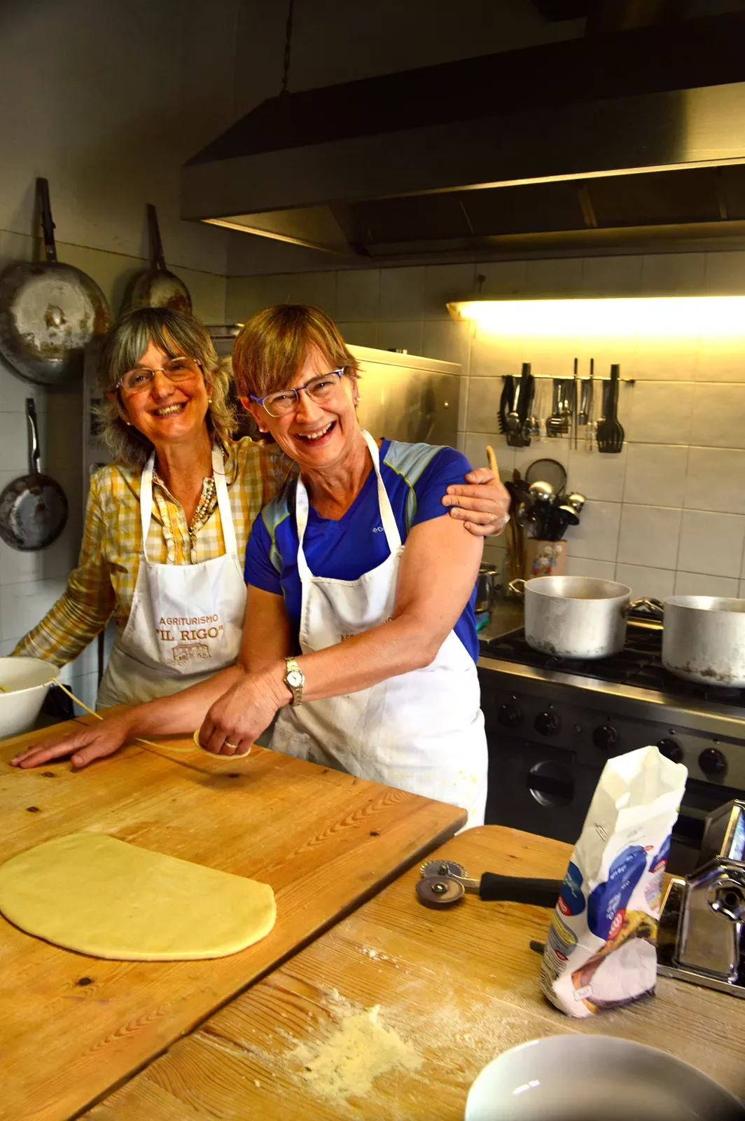 Guest and local guide at pasta making class.