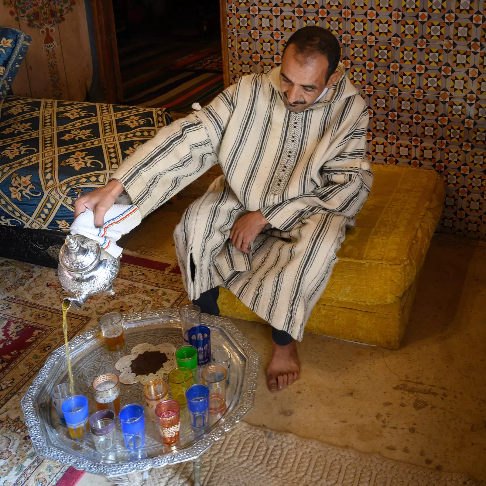 Moroccan man making tea