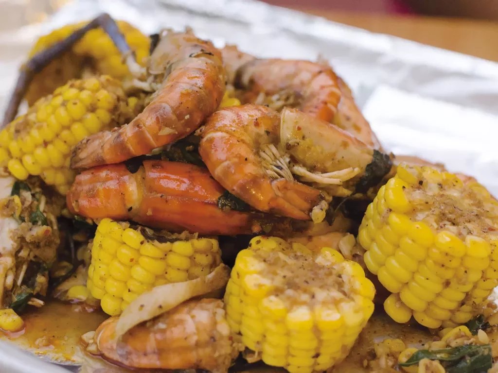 Close-up of shrimp boil ingredients.
