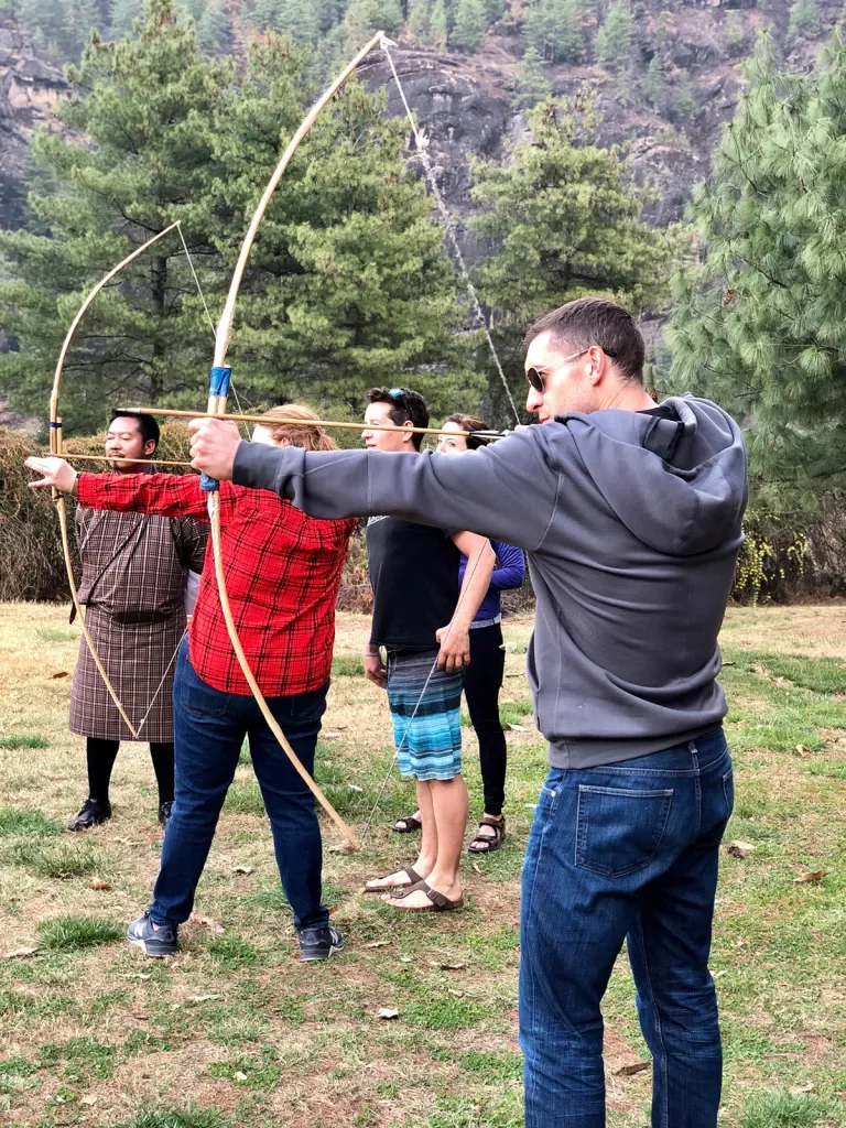 Guests practicing archery in Bhutan