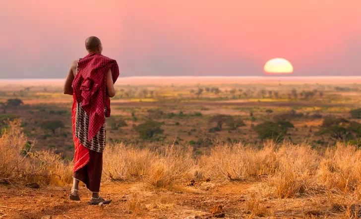Masai looking at the sunset in Tanzania