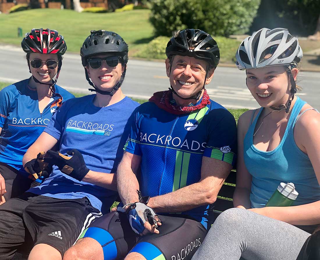 Tom Hale biking with his kids - Backroads