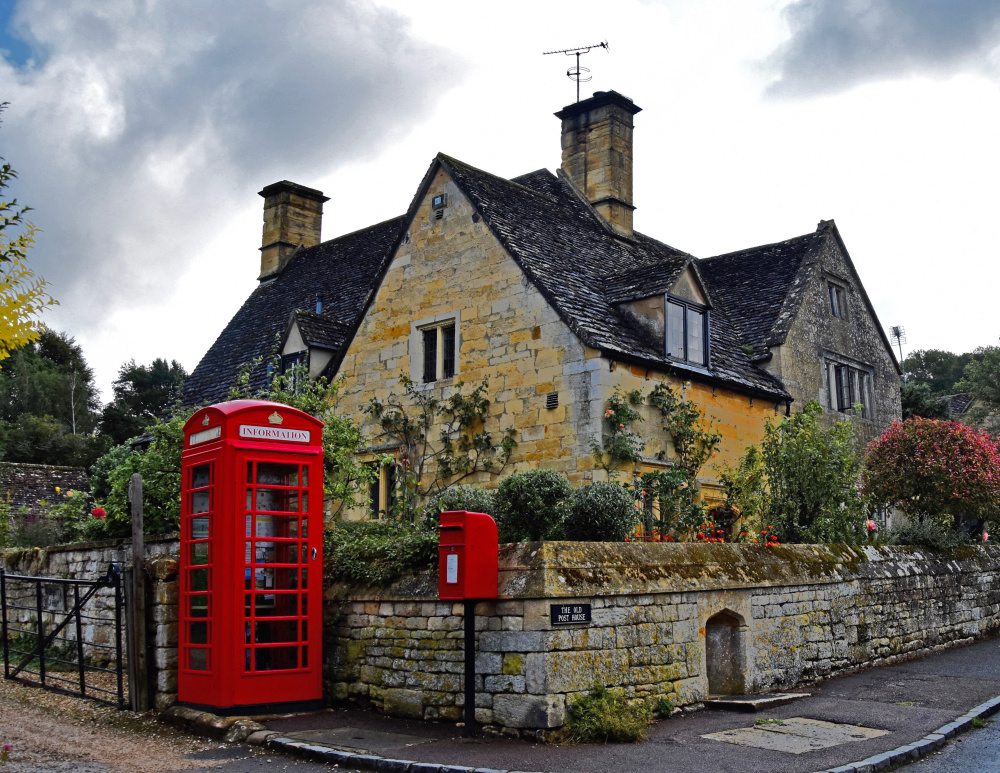 Cotswolds house and cute red phone booth