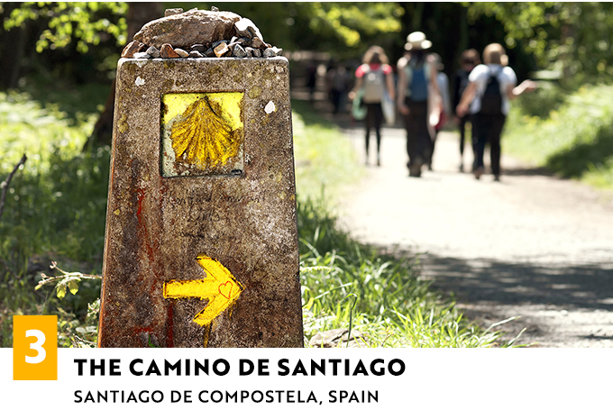 Yellow arrows of The Camino de Santiago in Santiago, Spain