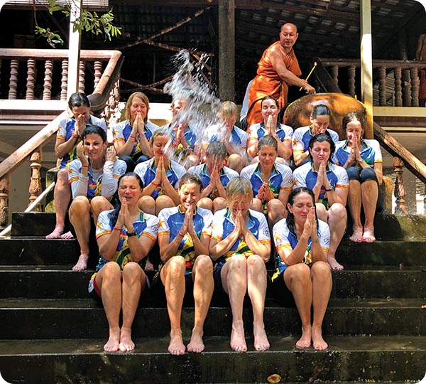 Private group receiving a water blessing in Siem Reap
