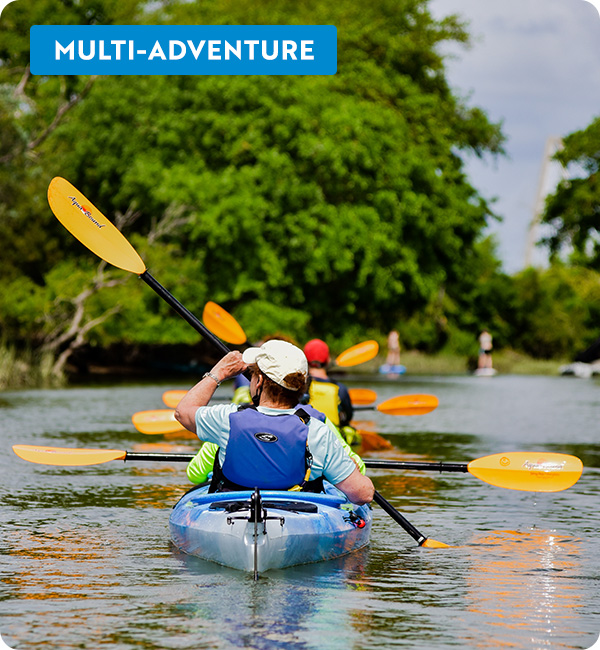 Kayakers in a river in the American south