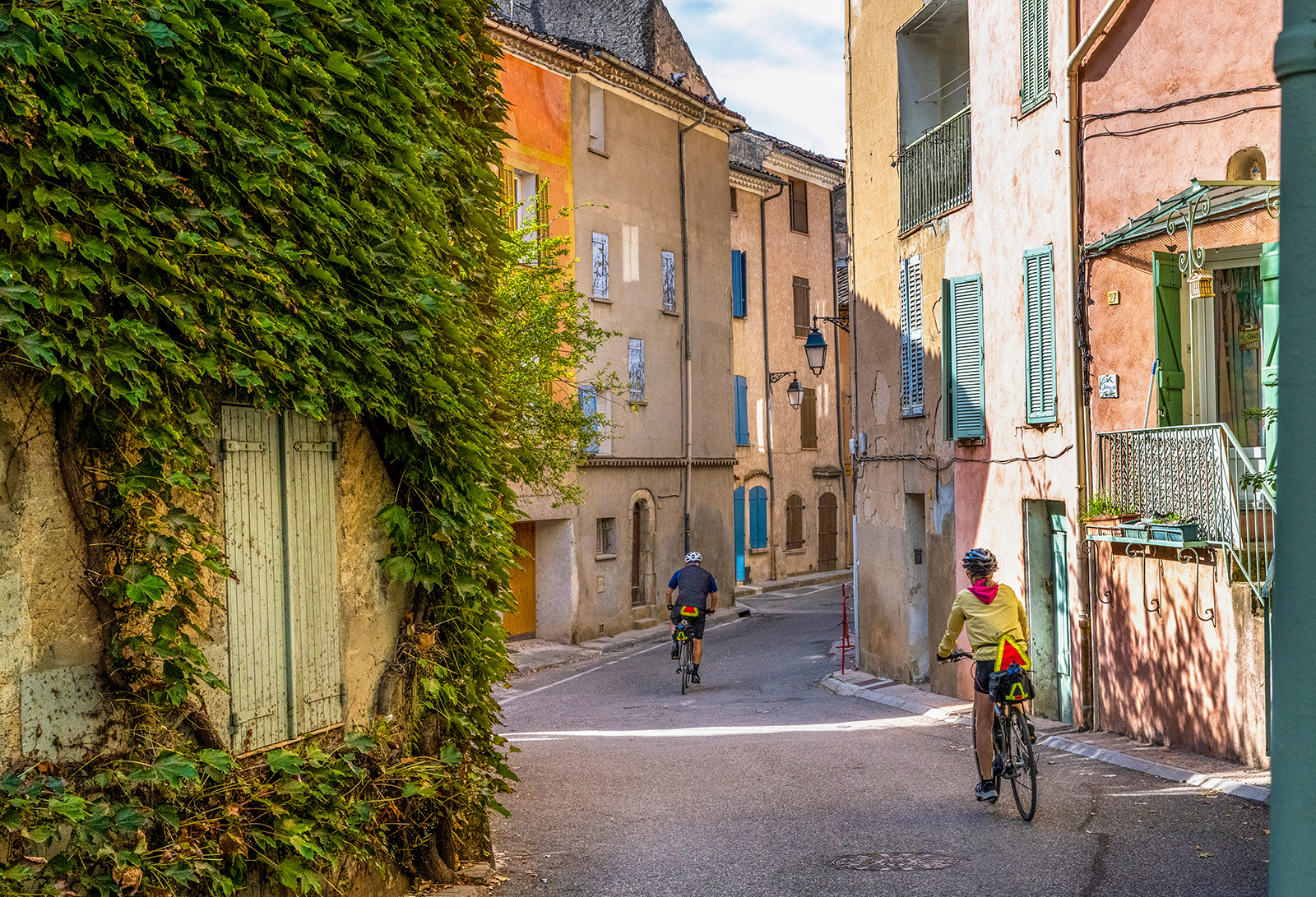 Backroads Guest Biking Through Town