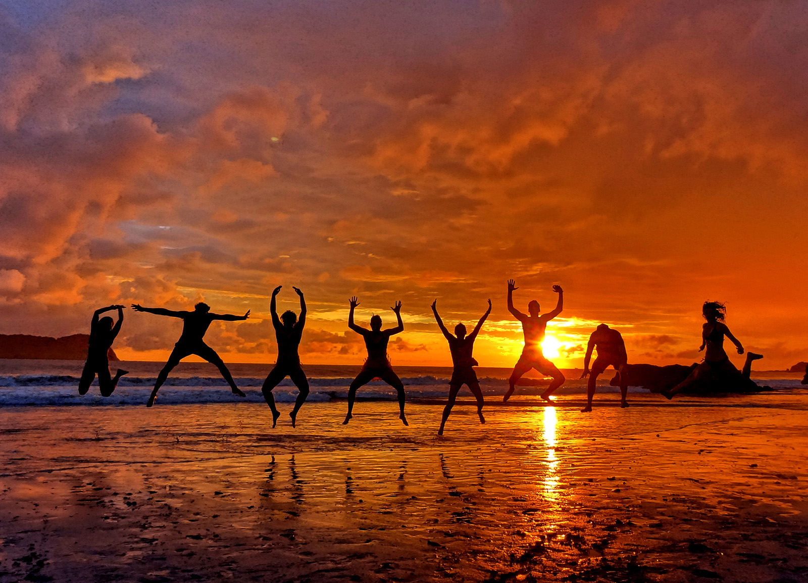 Jumping into the Sunset Beach Costa Rica