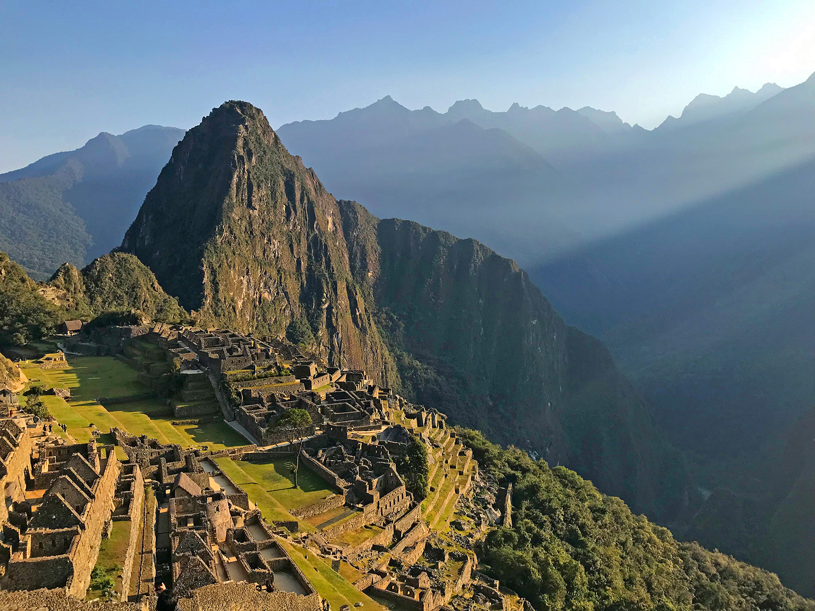 Wide shot of Machu Picchu during sunset.