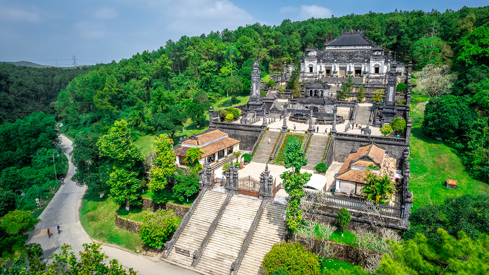 A temple with many steps built into a mountain side