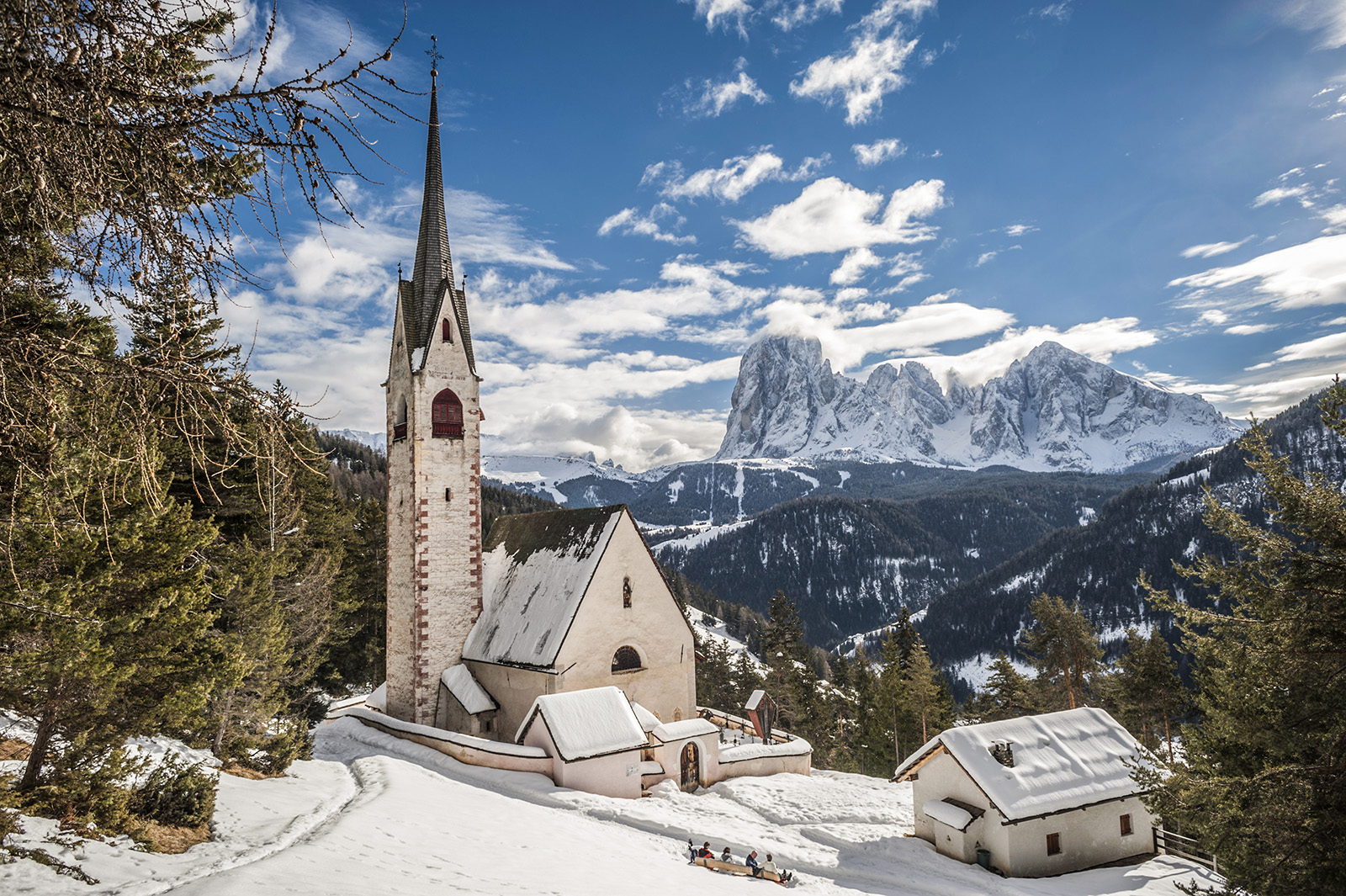Snow covers a church