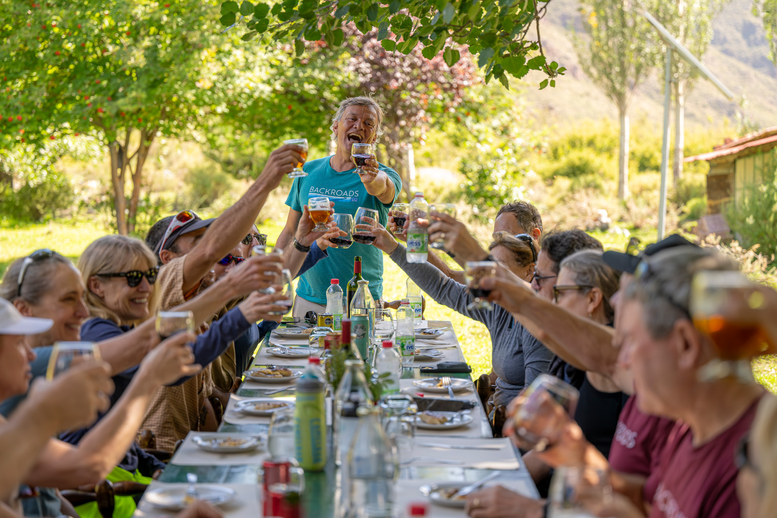table of guests cheersing
