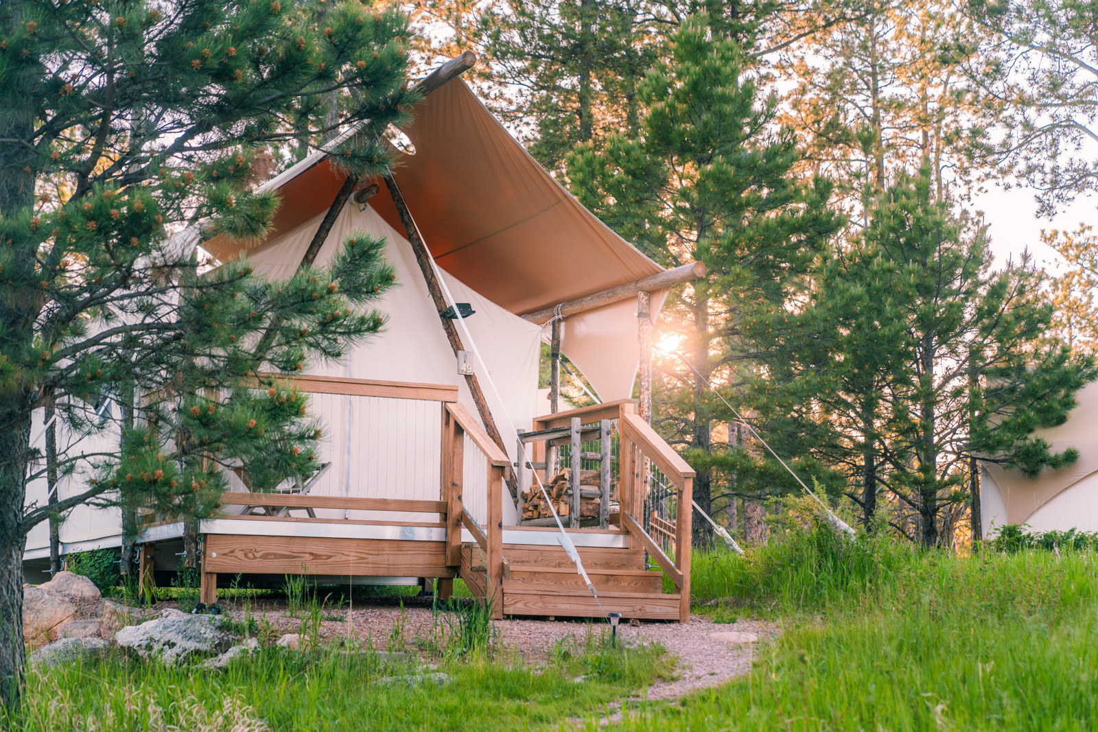 a glamping tent in the woods