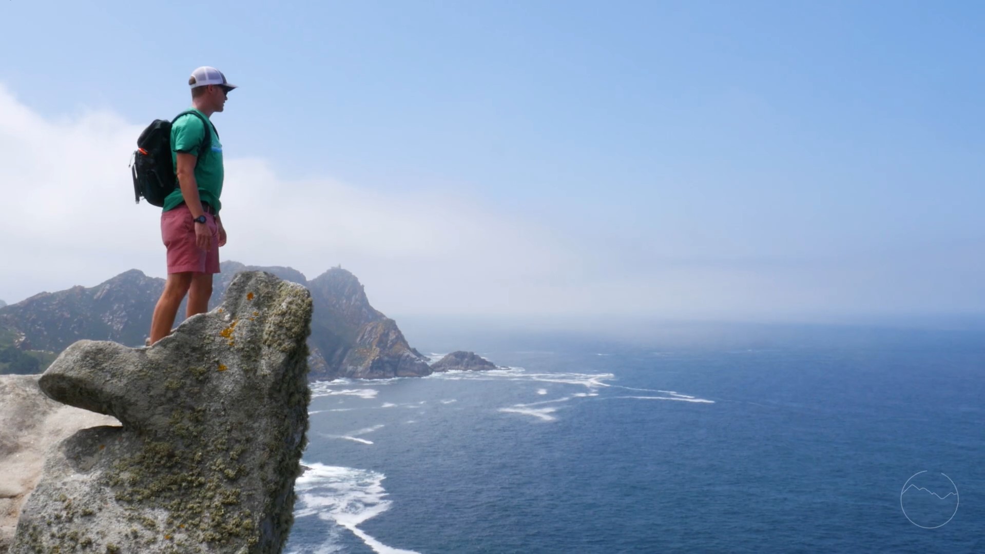 Man looking at the ocean from above