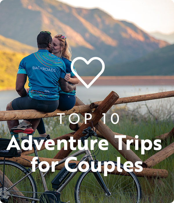 Text: Top 10 Adventure Trips for Couples ; Image: Couple Kissing