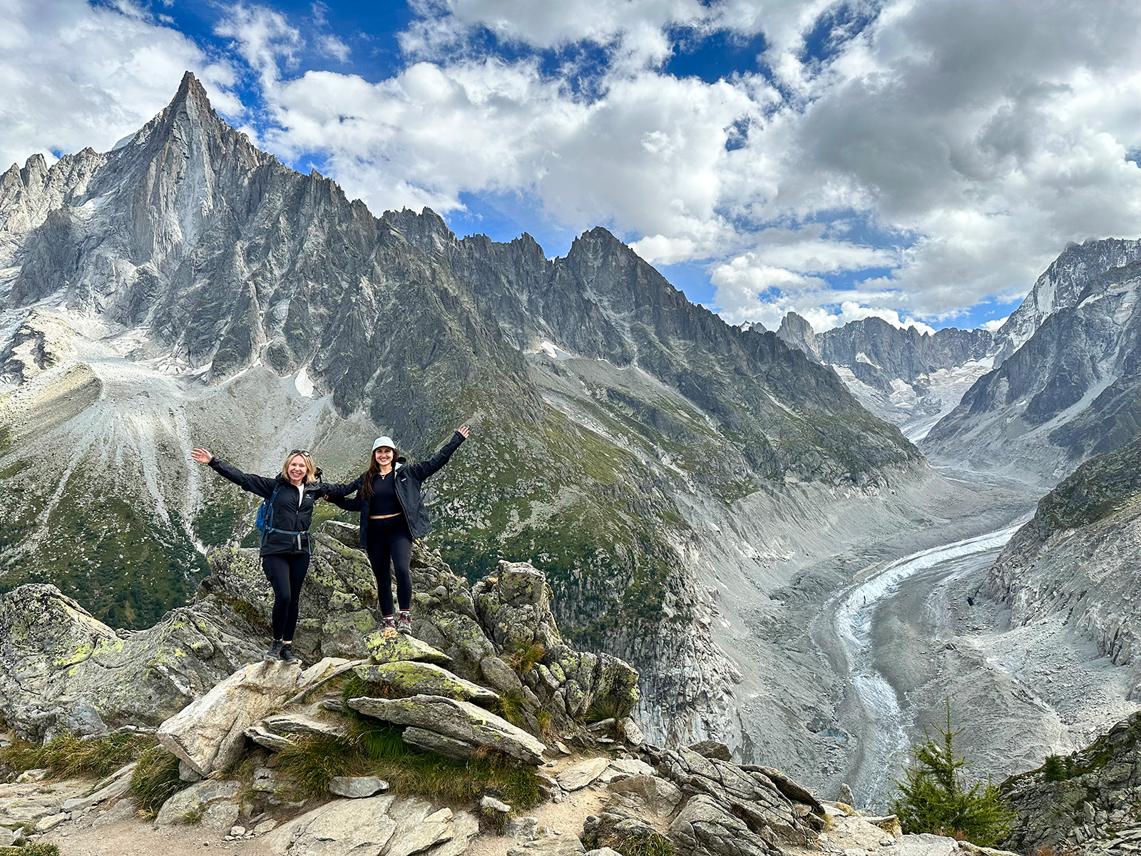 Two hikers on top a mountain