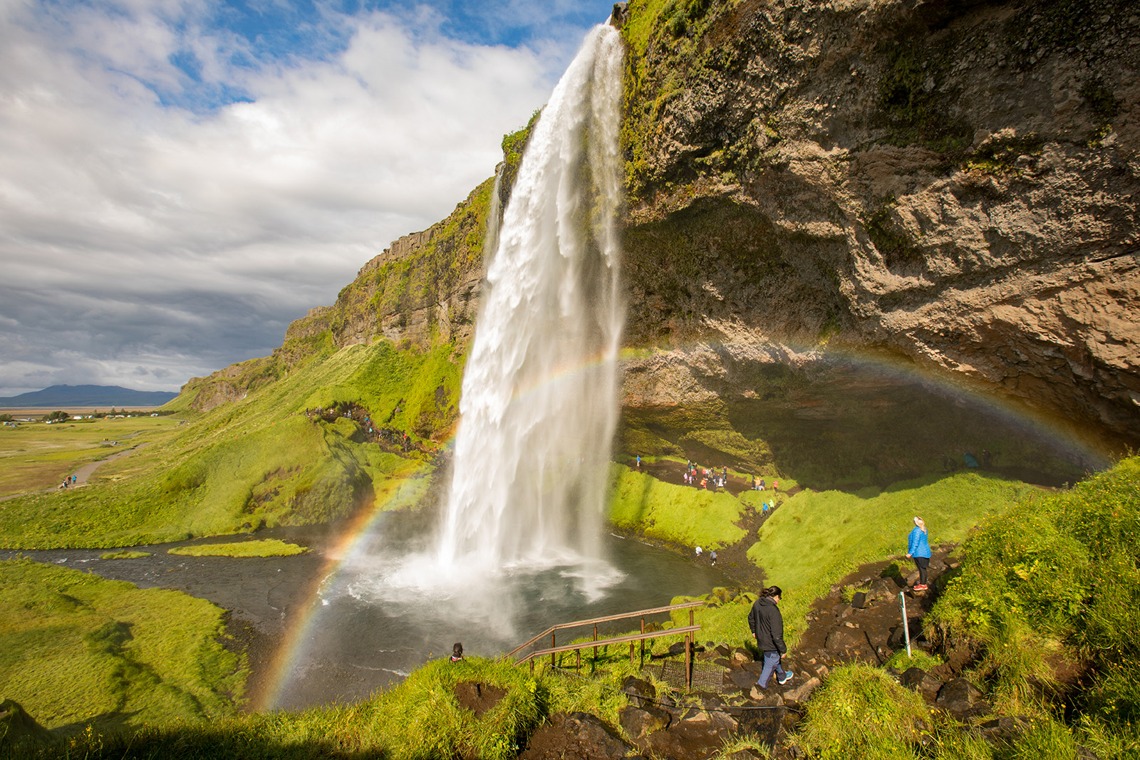 Cliffside waterfall with a pond at the bottom