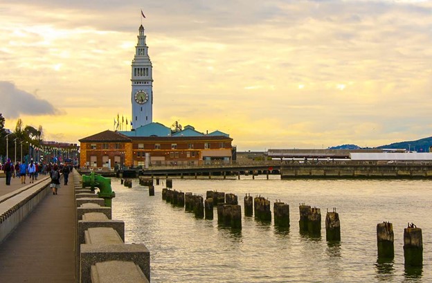San Francisco Embarcadero with clock tower and ocean in front