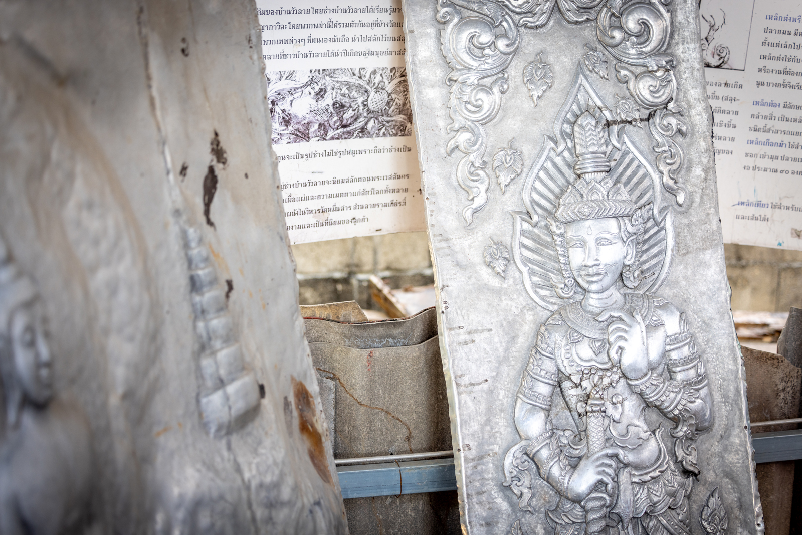 Steel slab with a Bhuddist sculpture engraved