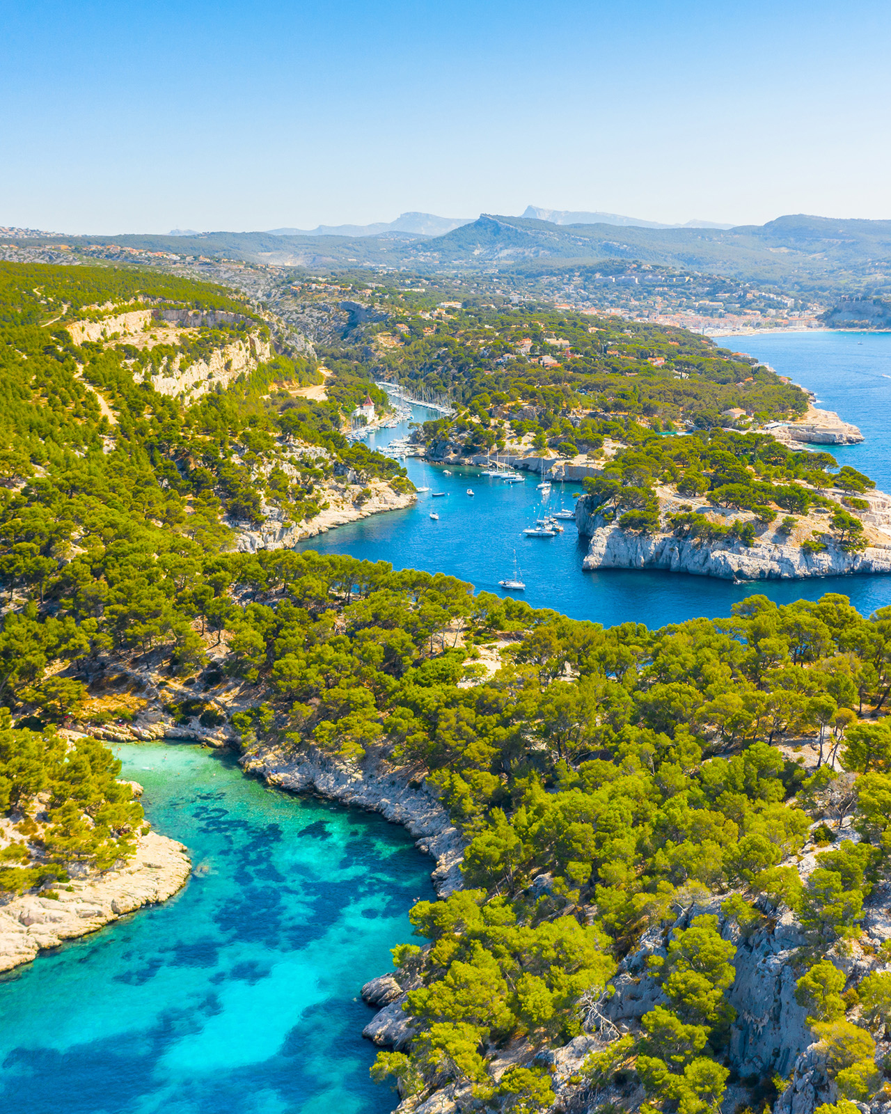 Drone shot of coves of blue water
