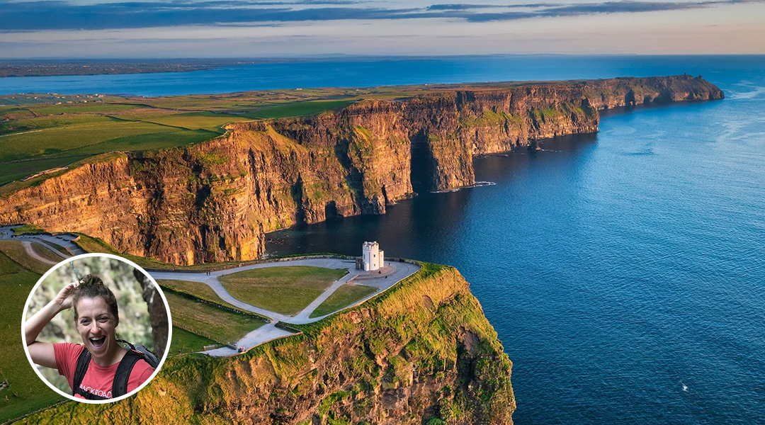 Cliffs overlooking water with house on the cliffside