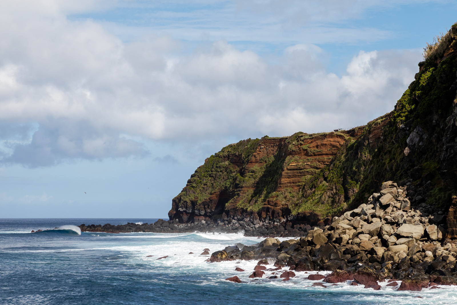 Large mountain cliff by the ocean