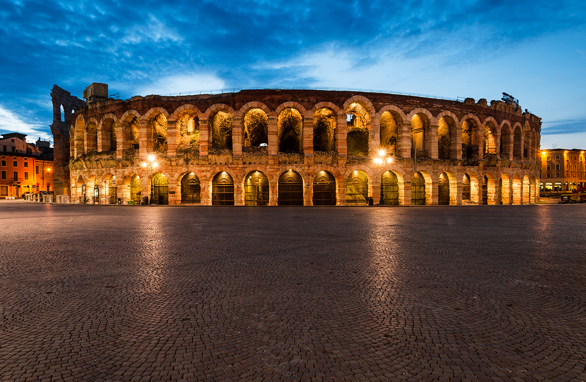 Roman castle illuminated by orange lights