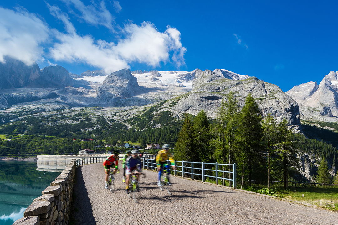 Ride epic mountain passes in the Dolomites.