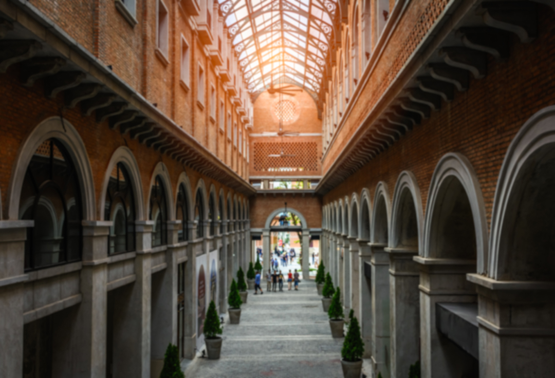 Long temple with people walking along the center pathway