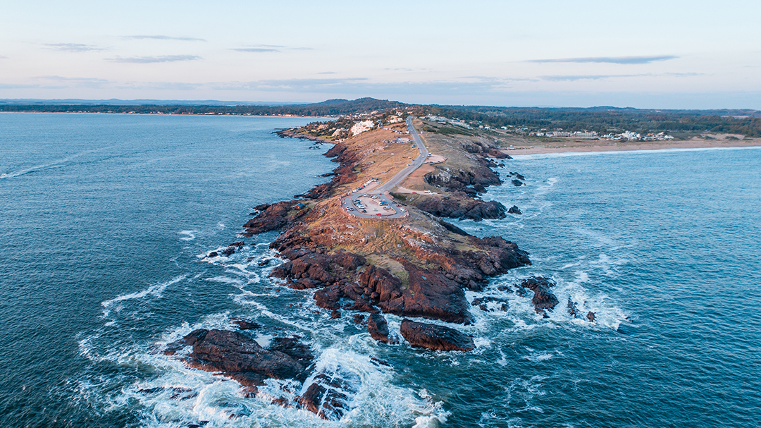 Coastal island surrounded by large cliffs and ocean