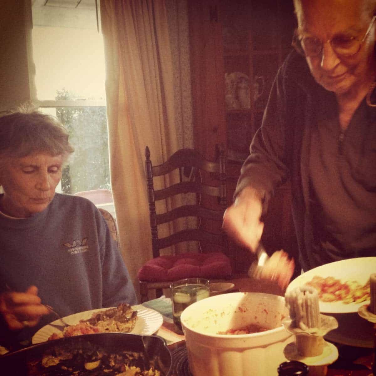 Don and Barbara share a meal with Warm Showers cyclists