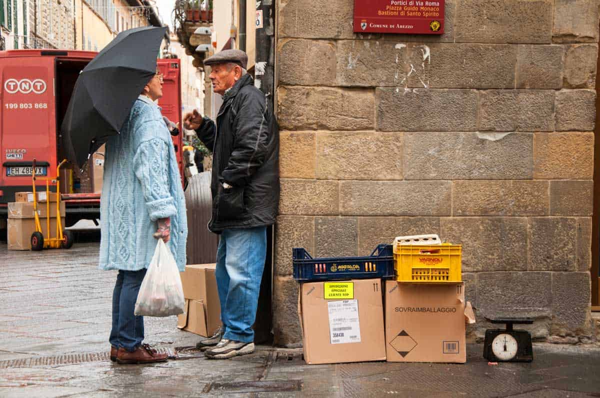 Tuscan man selling fruit on the streets of Arezzo, Italy