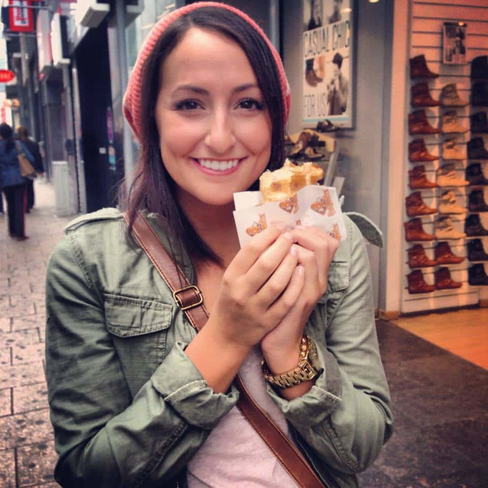 Backroads leader Marlee Newman eating a Belgian Liège Waffle