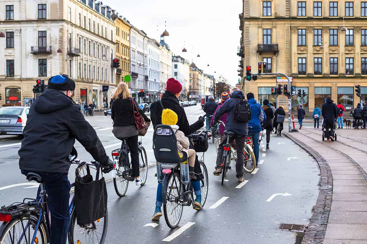 Bicyclists on road in Copenhagen - Shutterstock
