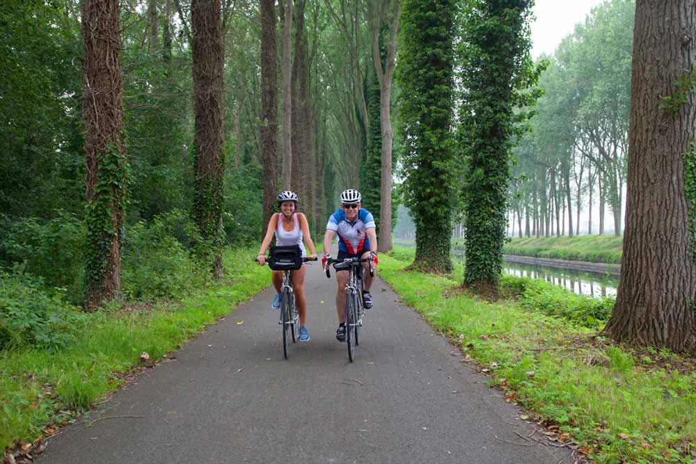 Backroads biking along the river bike path in the Netherlands