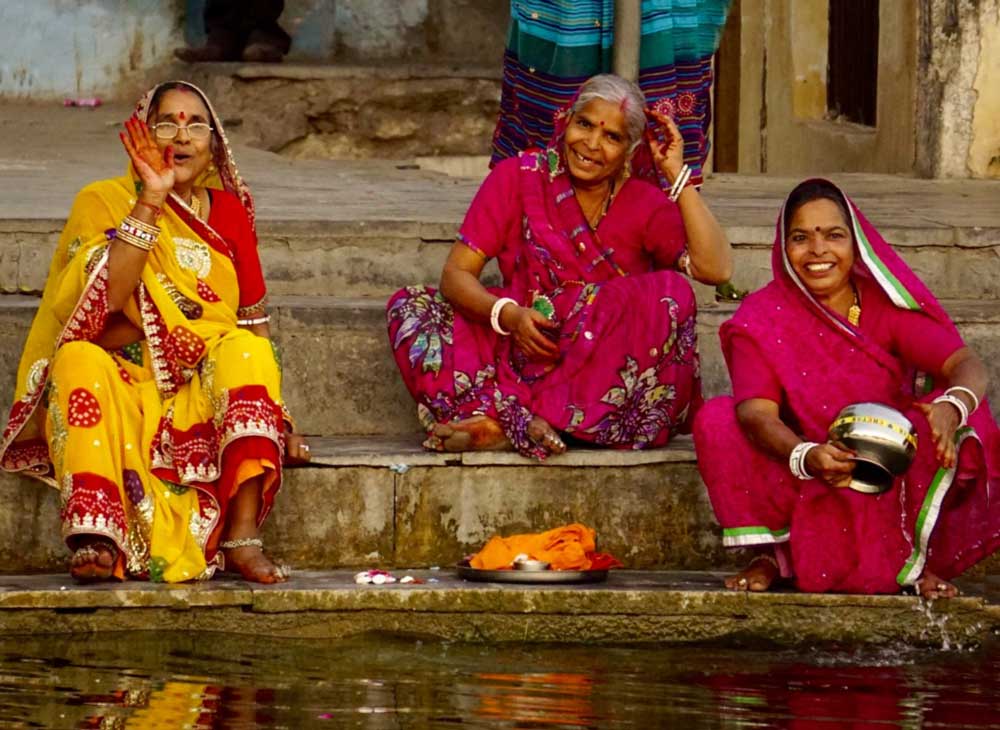 Local women waving in India