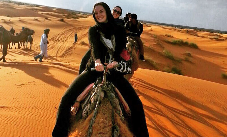 Riding camels in the Sahara in Morocco