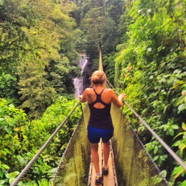 Sydney walking across the suspension bridge above the falls 200 feet below