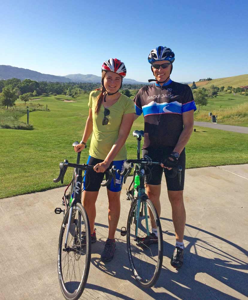 Backroads leader Zoe biking with her Dad