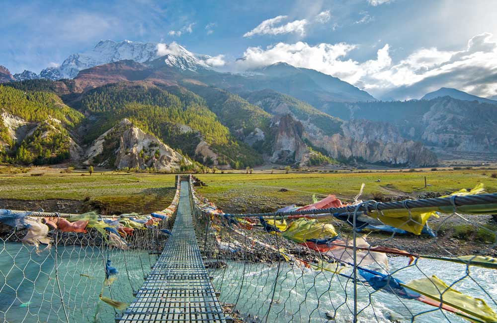 best adventure trips in november Nepal Pedestrian River Bridge