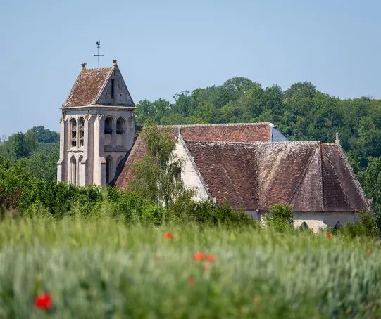Church building in the middle of a grassy velley
