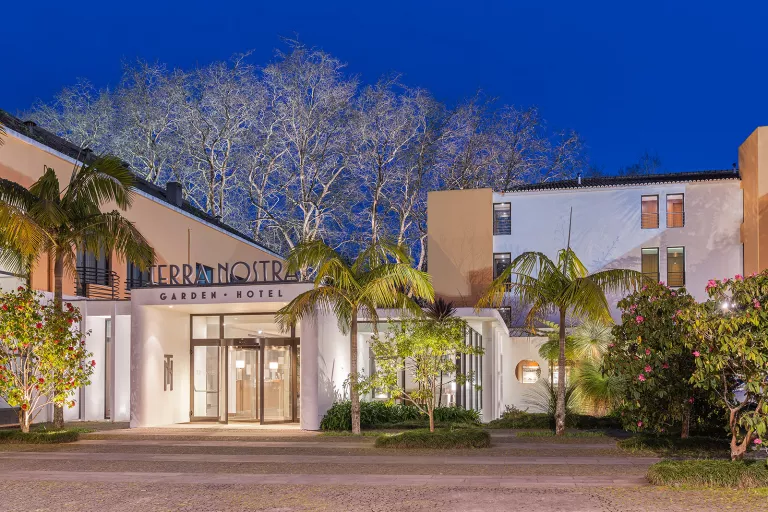 Exterior shot of Terra Nostra hotel at night.