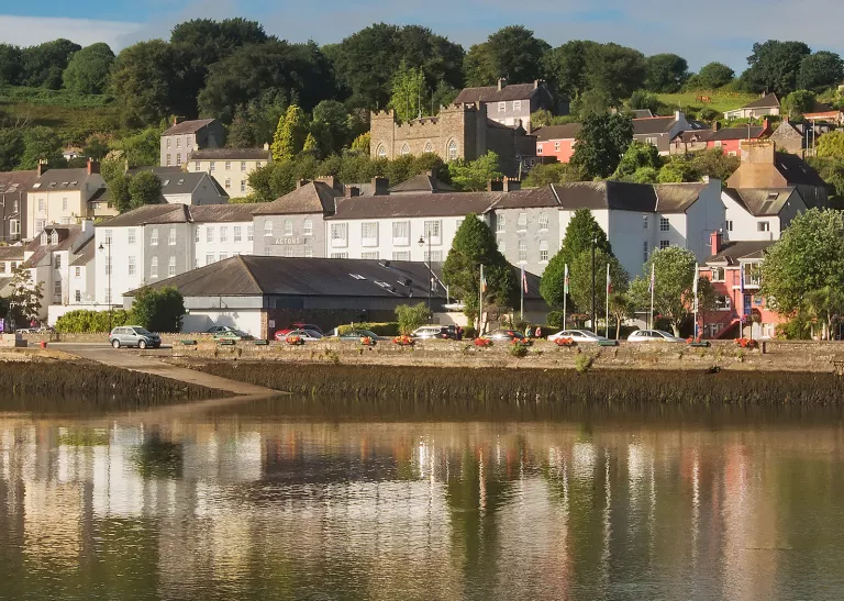 Exterior view of the Actons Hotel from across the water.