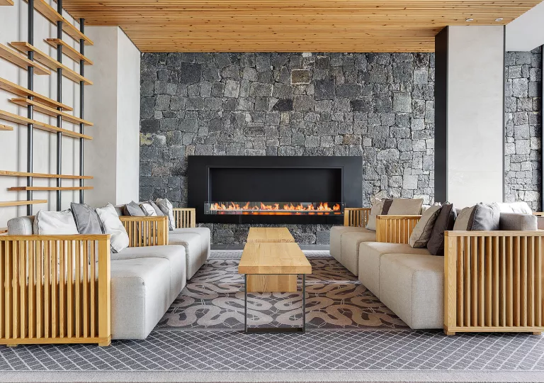 hotel living room with sleek fireplace
