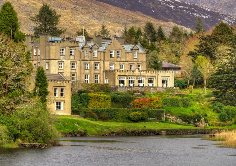large stone home in the hills